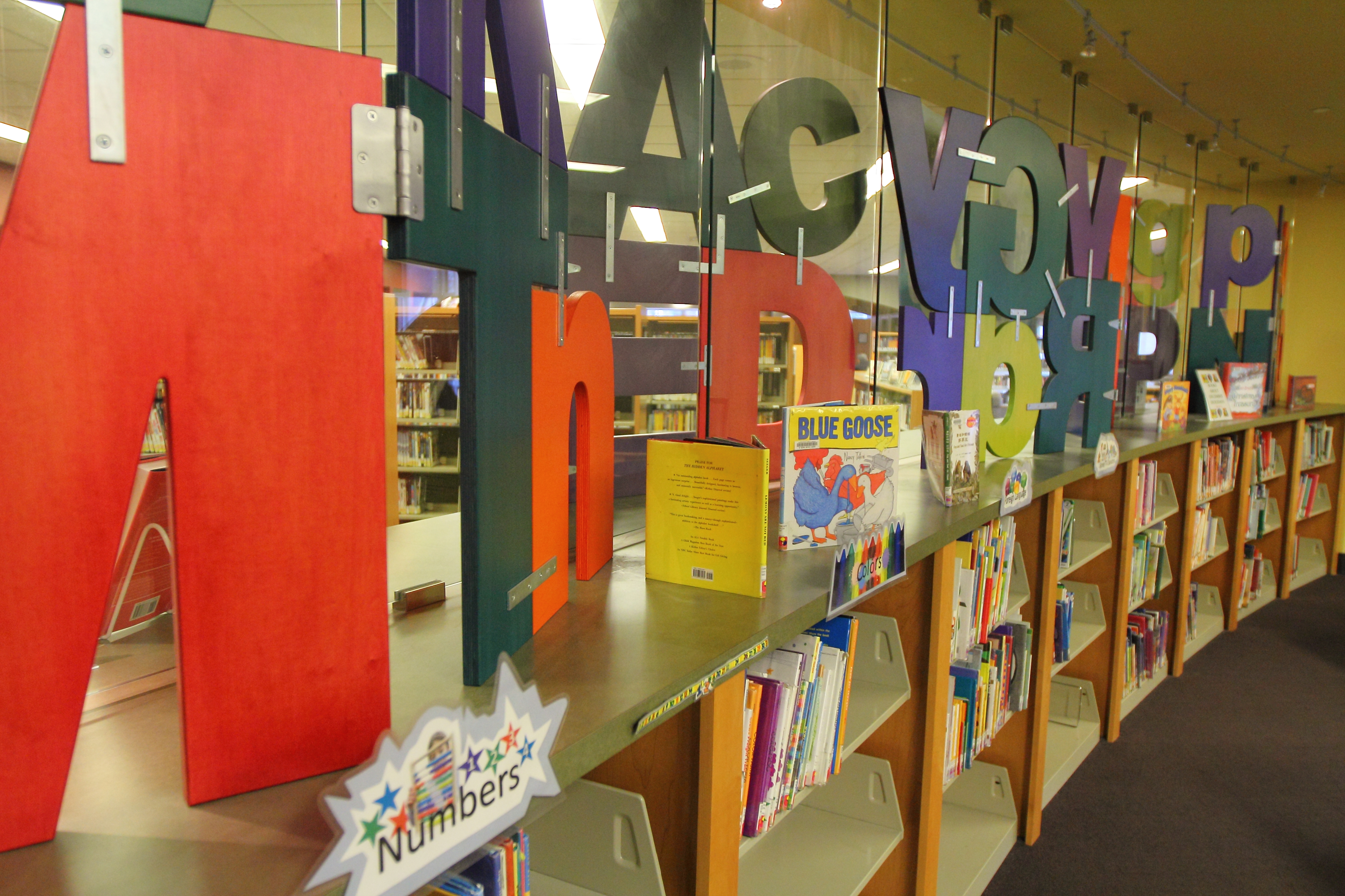 A wall that displays giant letters of the Roman Alphabet.